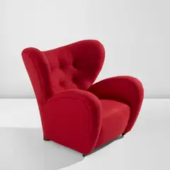 Flemming Lassen, Early "Den trætte mand" (The Tired Man) armchair, circa 1935, Beech, fabric upholstery, brass casters