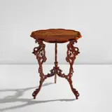 Émile Gallé, Parlant gueridon, circa 1900, French walnut, elm, maple, ebony, pearwood, and mother of pearl marquetry-veneered wood, carved French walnut