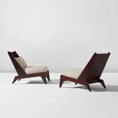 Pair of slipper chairs by André Sornay, 1950s, Sapele, sapele-veneered particle board, fabric upholstery, sold Feb 2025