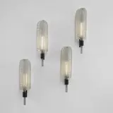 Tomaso Buzzi, Set of four large "Feather" wall lights, model no. 413, circa 1933, Bollicine glass, treccia glass, brass
