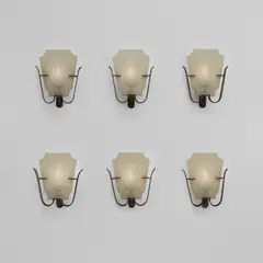 Set of six wall lights, designed for La Bottega di Pietro Chiesa by Tomaso Buzzi, circa 1930, Brass, glass, sold Jun 2025
