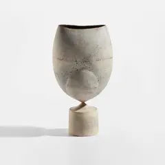 Hans Coper, "Cycladic" pot with spherical volume and oval lip, circa 1972, Stoneware, layered white porcelain slips and engobes over a body with textured and incised linear designs, the interior with manganese glaze