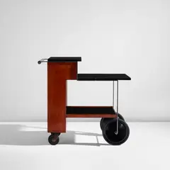 Eugene Schoen, Bar cart, 1935, Walnut, steel, chromium-plated brass, Bakelite-covered wood, painted steel, rubber