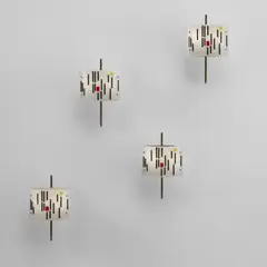 Set of four wall lights by Angelo Lelii, circa 1955, Brass, painted metal, acrylic, sold Jun 2025