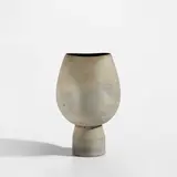 Hans Coper, Footed pot with four indents, circa 1975, Stoneware, layered white porcelain slips and engobes over a textured and incised body, the interior with a manganese glaze