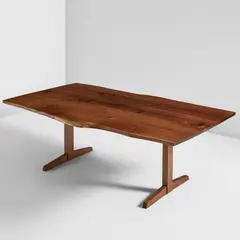 "Trestle" dining table by George Nakashima, 1974, American black walnut, seven East Indian rosewood butterfly keys, sold Dec 2025