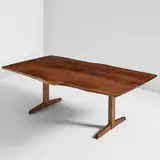 "Trestle" dining table by George Nakashima, 1974, American black walnut, seven East Indian rosewood butterfly keys, sold Dec 2025