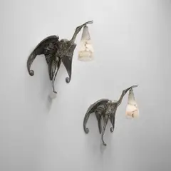 Albert Cheuret, Pair of "Cigognes" wall lights, circa 1925, Silvered bronze, alabaster