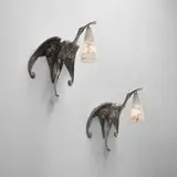 Albert Cheuret, Pair of "Cigognes" wall lights, circa 1925, Silvered bronze, alabaster
