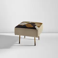 Ottoman, from the Gio Ponti residence, Via Dezza, Milan by Gio Ponti, circa 1957, Cowhide and leather upholstery, brass, rubber, sold Dec 2025