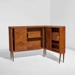 Gio Ponti, Corner bookcase, 1951, Laurel burl-veneered wood, brass