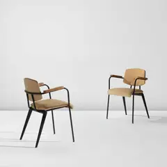 Pair of "Conference" armchairs, model no. 355 by Jean Prouvé, circa 1954, Painted steel, oak, vinyl upholstery, sold Dec 2025
