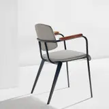 Jean Prouvé, "Conference" chair, model no. 355, circa 1953, Painted steel, oak, vinyl upholstery, rubber