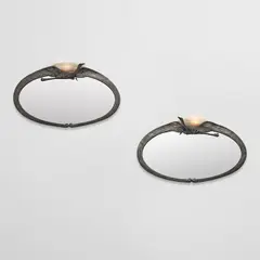 Pair of "Cigognes" illuminated mirrors by Albert Cheuret, circa 1925, Silvered bronze, alabaster, mirrored glass, sold Jun 2024