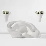 "Ear Sofa" and "Nose Sconces" by John Baldessari, 2009, Polyurethane rubber-covered memory foam, rigid polyurethane, sold Jun 2024