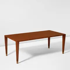 Rare dining table by Gio Ponti, 1950s, Mahogany-veneered wood, brass, sold Jun 2024