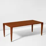 Rare dining table by Gio Ponti, 1950s, Mahogany-veneered wood, brass, sold Jun 2024