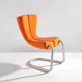 Marc Newson, "Komed" chair, designed 1996, produced 1998, Painted steel, fabric upholstery