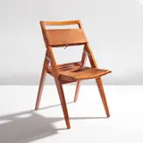 Lina Bo Bardi, Folding chair, model no. C4, circa 1950, Pau marfim, leather, aluminum