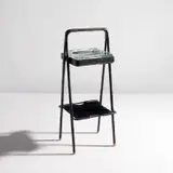 Jacques Adnet, Ash stand, circa 1955, Leather-covered steel, leather, glass, painted steel, brass