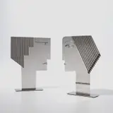 Two sculptures by Franz Hagenauer, 1970s, Nickel-plated brass, sold Feb 2024