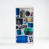 Massimiliano Adami, "Fossili Moderni" storage cabinet, 2005, Polyurethane foam, found plastic objects, painted particle board