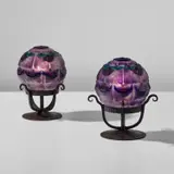 Joseph Gabriel Rousseau, Pair of "Fleur des Dunes" veilleuses, circa 1925, Pâte-de-verre, wrought iron