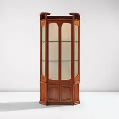 Vitrine by Hector Guimard, circa 1900, Pearwood, glass, brass, fabric, sold Dec 2024