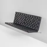 Pair of wall-mounted seats, model no. PK 26 by Poul Kjærholm, circa 1957, Chromium-plated steel, canvas, leather upholstery, sold Dec 2024