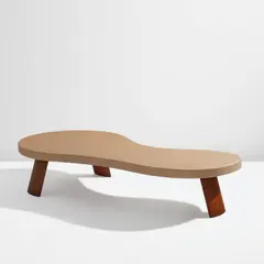 Paul Frankl, "Big Foot" coffee table, model no. 5028, circa 1948, Lacquered cork, walnut