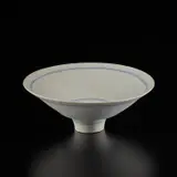 Lucie Rie, Footed bowl, circa 1978, Porcelain, matte white glaze with concentric inlaid blue lines repeated inside and out