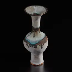 Lucie Rie, Bottle vase with flaring lip, 1985, Stoneware, grey and blue glaze with running golden manganese bands and inlaid shoulder and lip