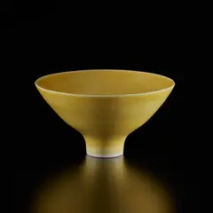Footed bowl by Lucie Rie, circa 1968, Porcelain, "American" yellow glaze, sold Dec 2024