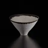 Lucie Rie, Large conical "Rice" bowl, circa 1978, Porcelain, matte white glaze with golden manganese rim, the glaze flowing into pierced dots in the body