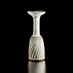 Lucie Rie, Vase with fluted body and flaring lip, circa 1960, Stoneware with manganese speckle, pitted white glaze over diagonally fluted body