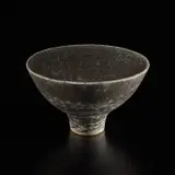Lucie Rie, Footed bowl, circa 1981, Stoneware, volcanic black glaze