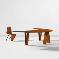 André Bloc, "Boomerang" desk and chair, designed for the Villa Bellevue, Meudon, France, circa 1951, Oak, oak-veneered wood, beech