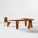 André Bloc, "Boomerang" desk and chair, designed for the Villa Bellevue, Meudon, France, circa 1951, Oak, oak-veneered wood, beech