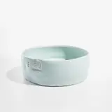 Low cylinder by Edmund de Waal, circa 1997, Porcelain, celadon glaze, sold Feb 2023