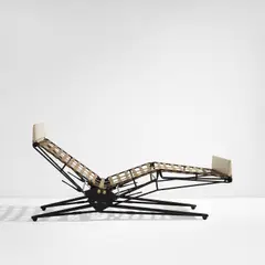 Adjustable chaise longue, model no. L77 by Osvaldo Borsani, circa 1957, Painted steel, rubber webbing, brass, sold Feb 2023