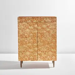 "Piccolo Coromandel" cabinet by Piero Fornasetti, 1950s, Burl walnut-veneered wood with applied gold leaf, brass, sold Jun 2023