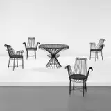 Mathieu Matégot, "Cap d'Ail" table and set of four armchairs