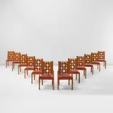 Claggett Wilson, Set of twelve dining chairs, circa 1930, Birds-eye maple and satinwood-veneered wood, fabric upholstery