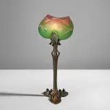 "Nénuphar" table lamp by Daum Frères and Louis Majorelle, circa 1903, Wheel-carved, overlaid, acid-etched and applied glass, patinated bronze, sold Jun 2023