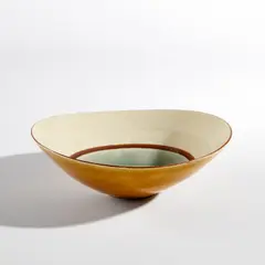 Bowl by Lucie Rie, circa 1960, Porcelain, yellow glazed exterior, white and green well with manganese band, sold Jul 2023