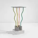 "Le Strutture Tremano" table by Ettore Sottsass, circa 1979, Painted steel, plastic laminate-covered wood, glass, sold Jul 2023