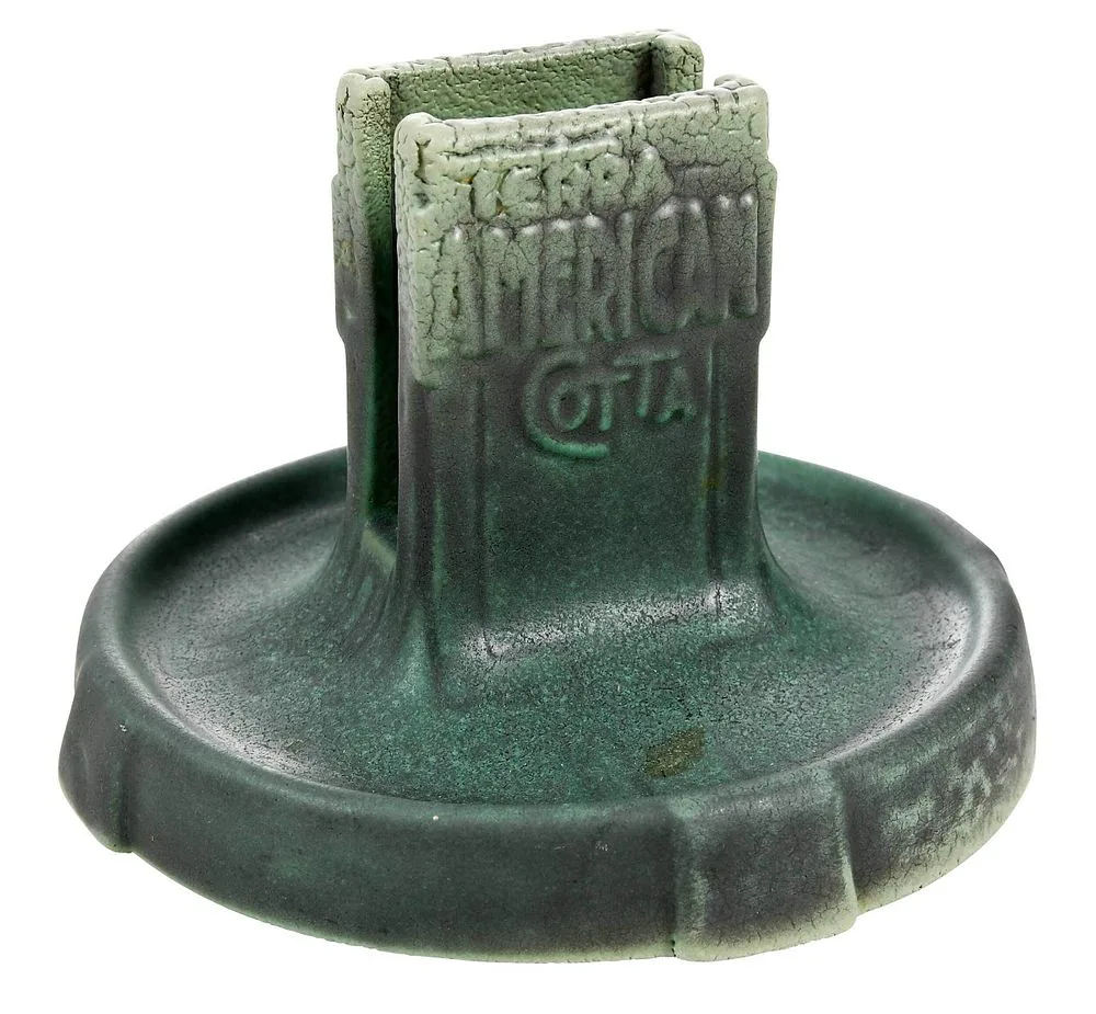 Art Pottery Match Stand by Teco, on circular base,ÿcovered in a matte green glaze and thinning to a crawl type glaze at the top, sold Sep 2021