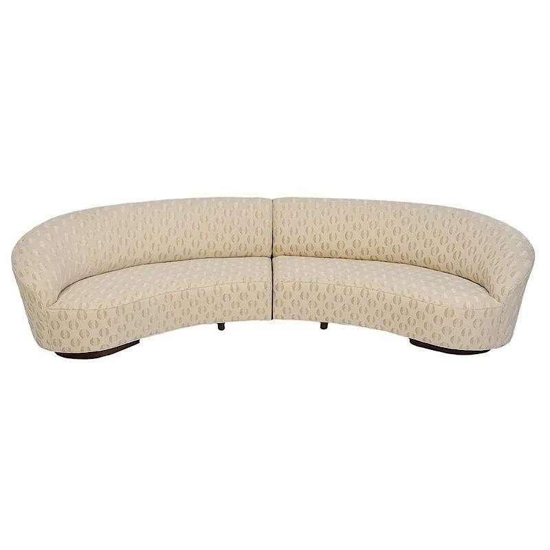 Sloane Sofa by Vladimir Kagan, in two sections with cream upholstery and walnut veneered base,Â 30 x 74 x 29 in, sold Jul 2017