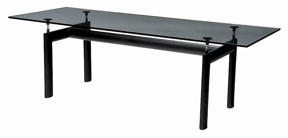 Designed LC-6 Table by Le Corbusier, 1928, features a clear glass top over a steel base, offered Mar 2017