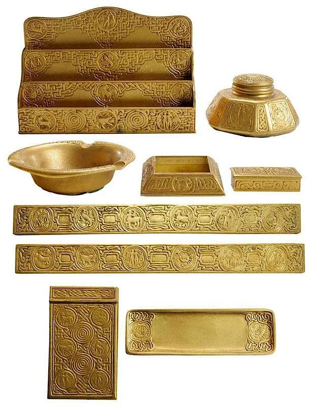 Zodiac Pattern Partial by Tiffany Studios, 1855, including hexagonal inkwell with glass inset (shape 1072), sold Mar 2015
